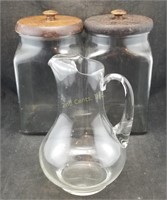2 Glass Jars W/ Lids & Pitcher