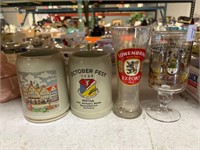 4 Vintage stoneware and glass beer steins