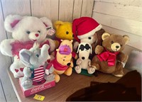 Assorted stuffed toys, Coke Elephant, Snoopy dog