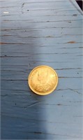 GOLD COLORED FOREIGN COIN