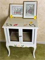 Painted Stand with Glass Doors and Two Small Pic