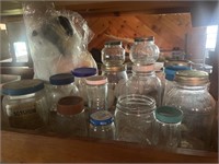 Large selection of vintage glass  jars with lids