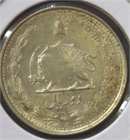 Silver foreign coin quarter size