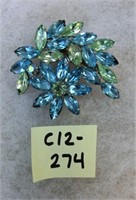 C12-275 blue rhinestone floral form brooch 2" x 2