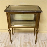 Deeply Beveled Glass Chocolate Service Cabinet.