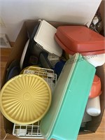 Large box full of storage containers and more