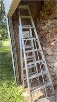 Two aluminum ladders, one small, 6 foot one 10