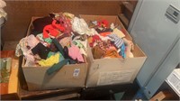 2 boxes of Barbie doll clothes