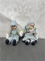 Boy and girl porcelain dolls
