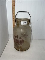 One gallon glass jar with metal handle
