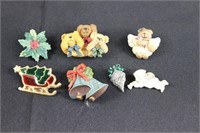 Assorted Brooches Featuring Christmas