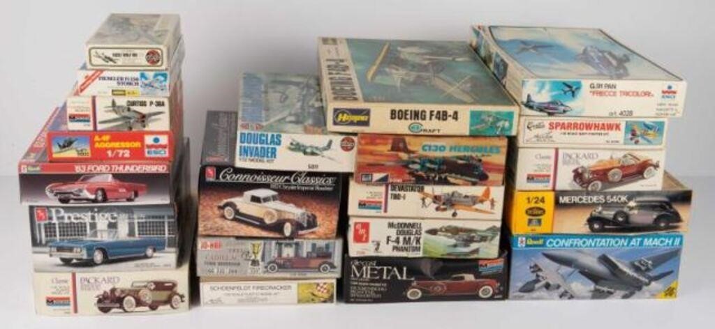 Lot of 21 Model Car and Aircraft Kits.