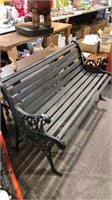 Cast iron park bench with wood slats ornate