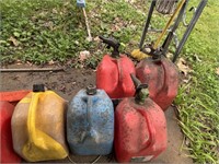 5 gas cans and contents