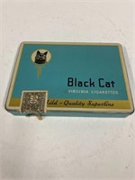 Black Cat cigarette tin.