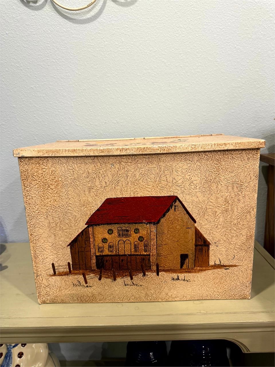 Antique milk crate with painting