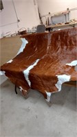 Finished cow hide rug 89x79in