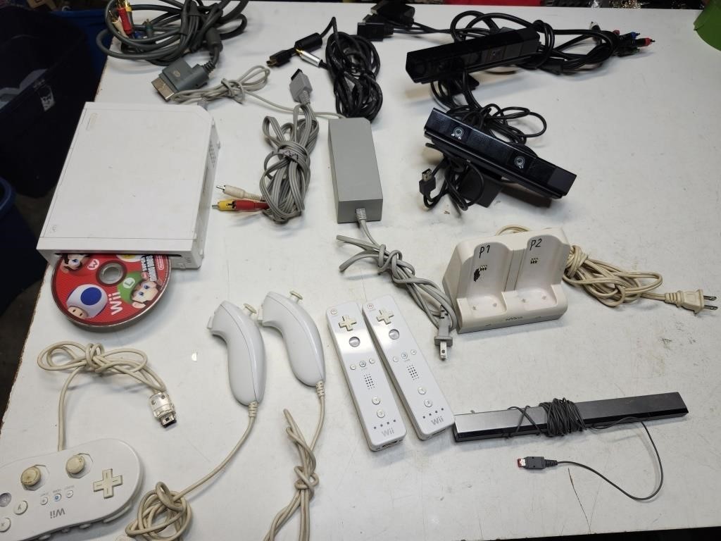 Nintendo Wii with controllers and other