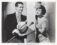 Free and Easy Robert Cummings and Ruth Hussey sign