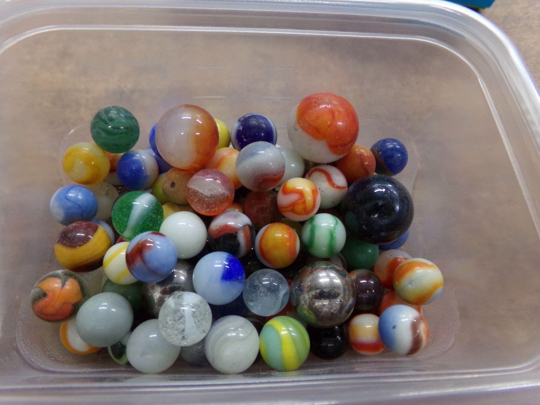 75 old marbles