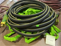 Two lawn and garden hoses unknown length
