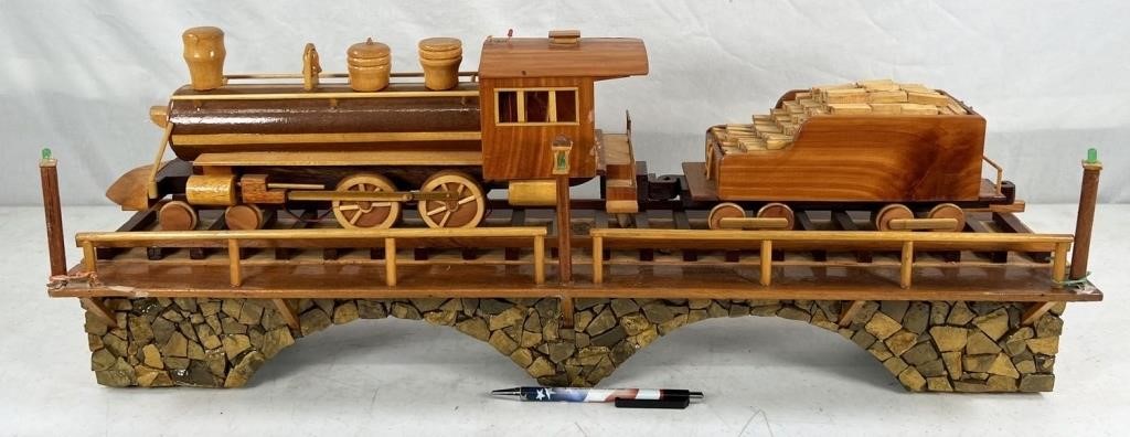 vintage wooden train on bridge