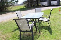 Metal, tempered glass patio table with four
