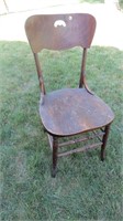 Old chair to refinish for garden ornament
