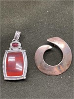 TWO STERLING SILVER PENDANTS - ONE WITH RED