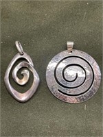 TWO STERLING SILVER SPIRAL PENDANTS (2.25in T AND