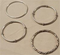 351 - LOT OF 4 SILVER BANGLE BRACELETS (W63)