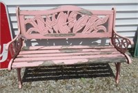 Cast metal and wood bench. Measures: 49.75" Wide.