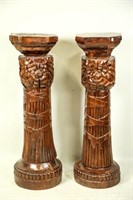 PAIR OF CARVED INDONESIAN PEDESTALS