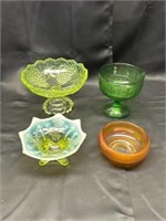 Four pieces of glassware, three candy dishes, and