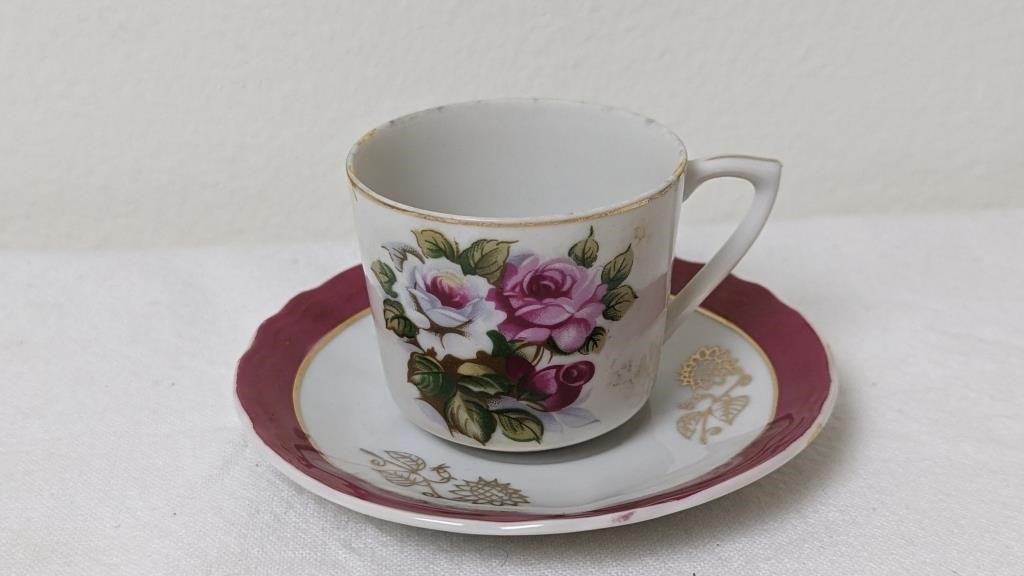 JAPAN IRIDESCENT DEMITASSE TEA CUP AND SAUCER