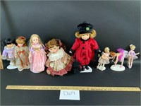Lot of 8 small dolls-see description