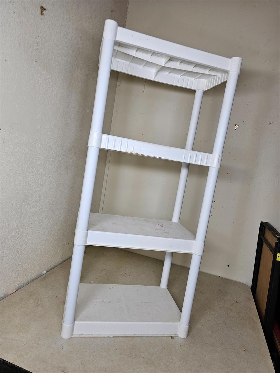 White plastic stackable shelf