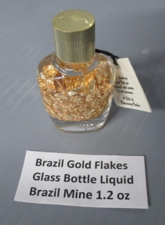 Brazil Gold Flakes in Liquid Filled Glass Bottle.