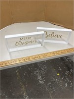 Christmas and believe signs