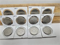 12 1 DOLLAR COINS 6-1975 AND 6-1975
