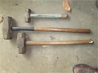 three sledge hammers