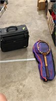 Luggage bag, tennis racket, and holder