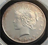 Replica of a Peace Dollar 1-Oz Silver Round