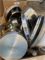 Box of pots pans lids