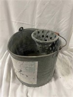 Antique 11” mop bucket. This is heavy duty metal,