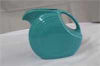 Fiestaware turquoise disk pitcher. 7.75'H