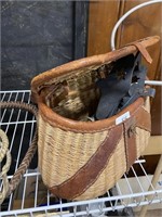 wicker basket with vintage skates and fishing net
