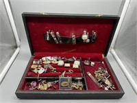 jewelry box loaded with men's cuff links including