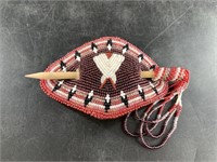 Single intricately beaded hair pin in Native Ameri