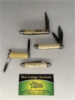 4 White Handled Pocket Knives